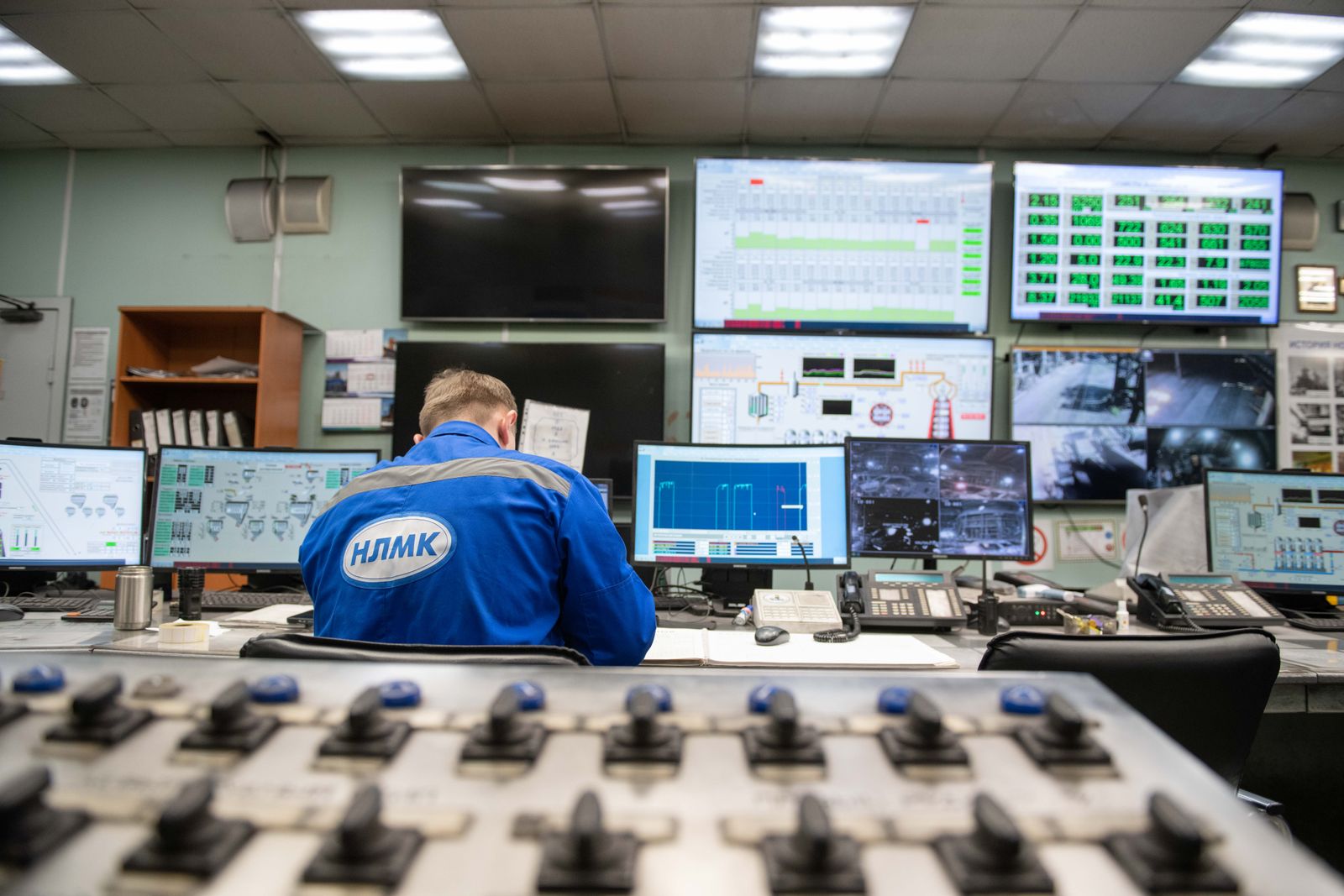 An engineer reviewing production data
